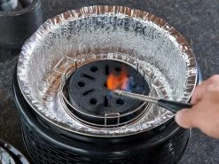 COBB 6 CobbleStones -Kampeeruitrusting sfeerfoto cobb pro zwart aansteken cobble stone ecommerce 3a32